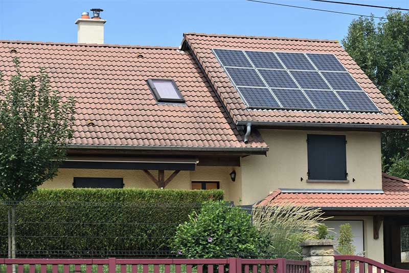 House with solar panels on the roof.