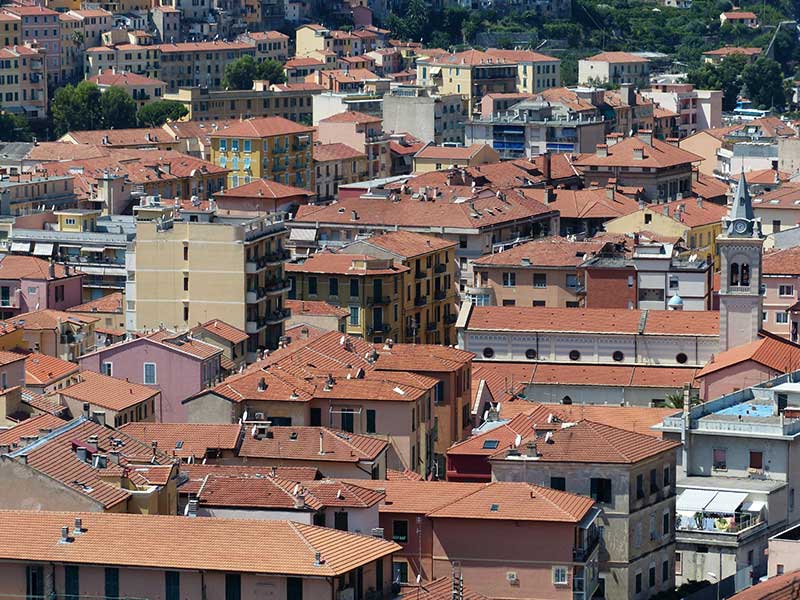 Terracotta rooftops in a city, sunny day